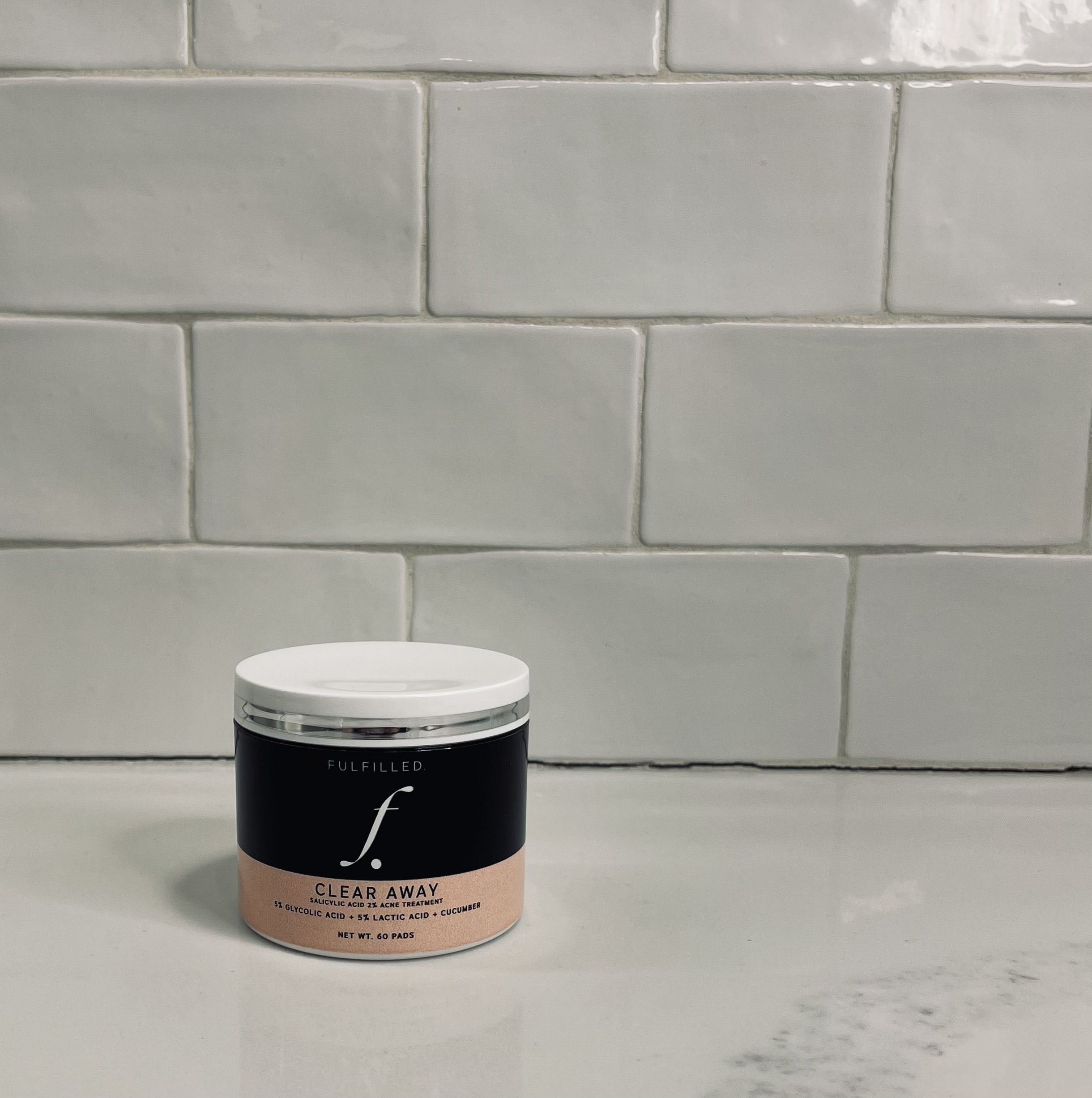 <p><span style="color: rgb(0, 0, 0); font-size: 15px">Pre-dosed treatment pads with 5% Glycolic Acid, 5% Lactic Acid, and Cucumber to gently exfoliate, unclog pores, and calm inflammation. Designed for moderate to severe acne-prone skin, this daily treatment targets active breakouts while helping prevent future flare-ups—revealing a clearer, smoother, blemish-free complexion.</span></p>